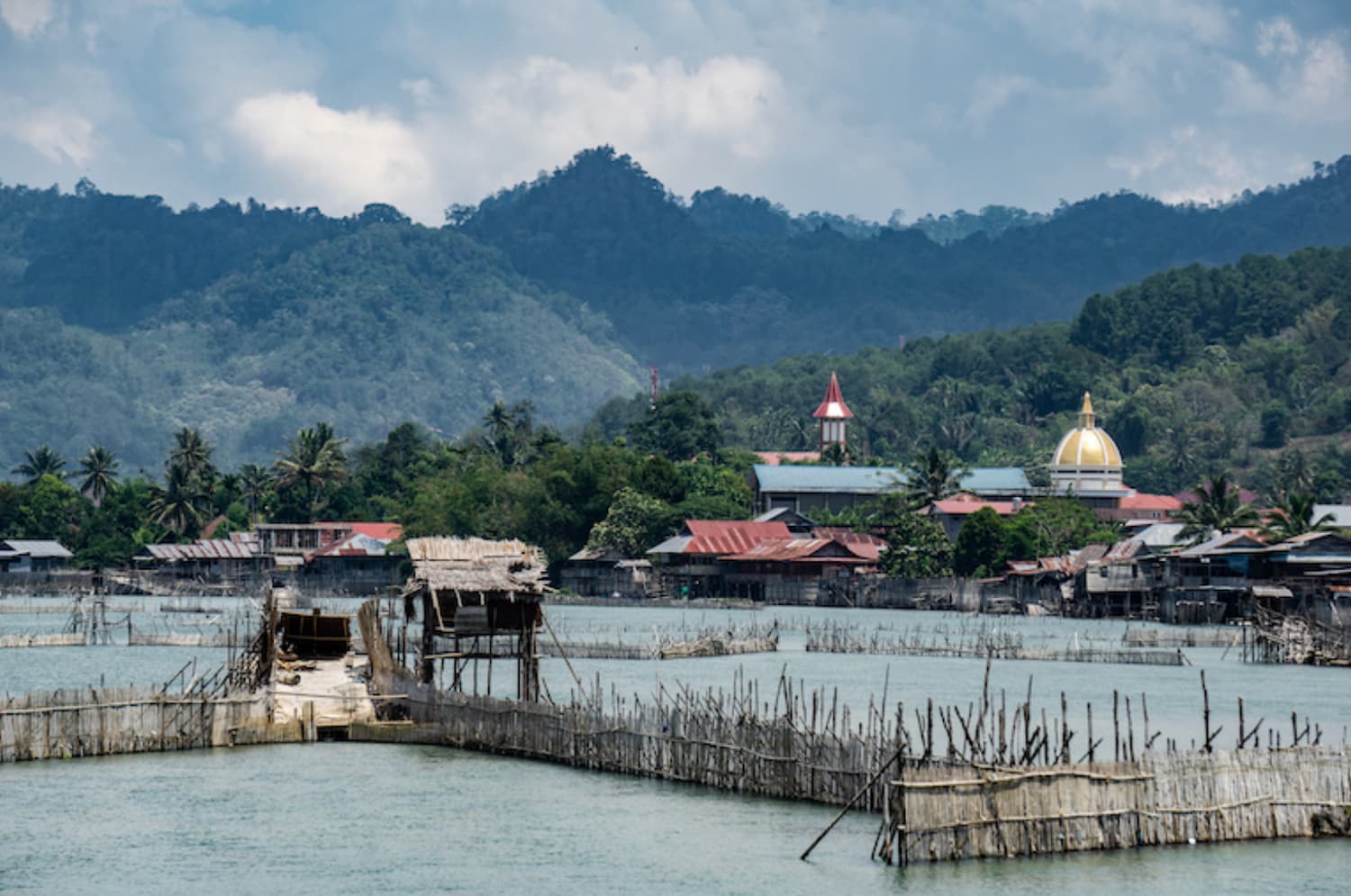 Structures for Wayamasapi, a tradtional eel fishing method, near Tentena town at the mouth of Lake Poso. Image by Ian Morse for Mongabay.