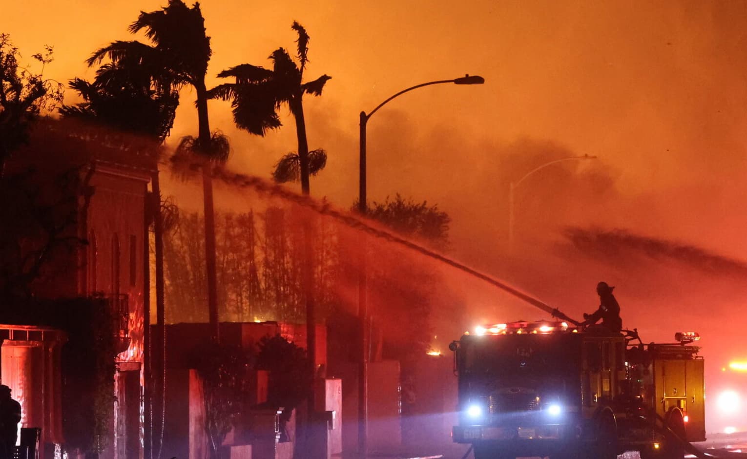 Fire crews battling the Palisades fire in Southern California, courtesy of Cal Fire.