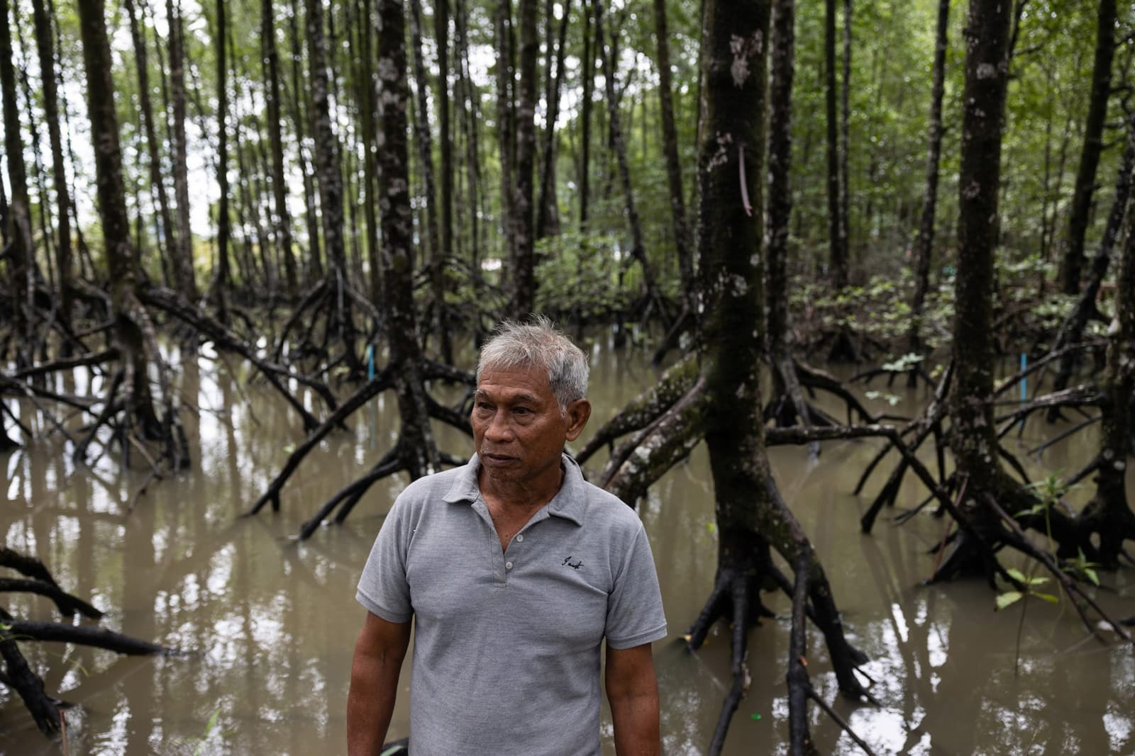 Watchara Kumpai used to work in the logging and tin mining industries, but now helps his community protect its mangroves in the south of Thailand