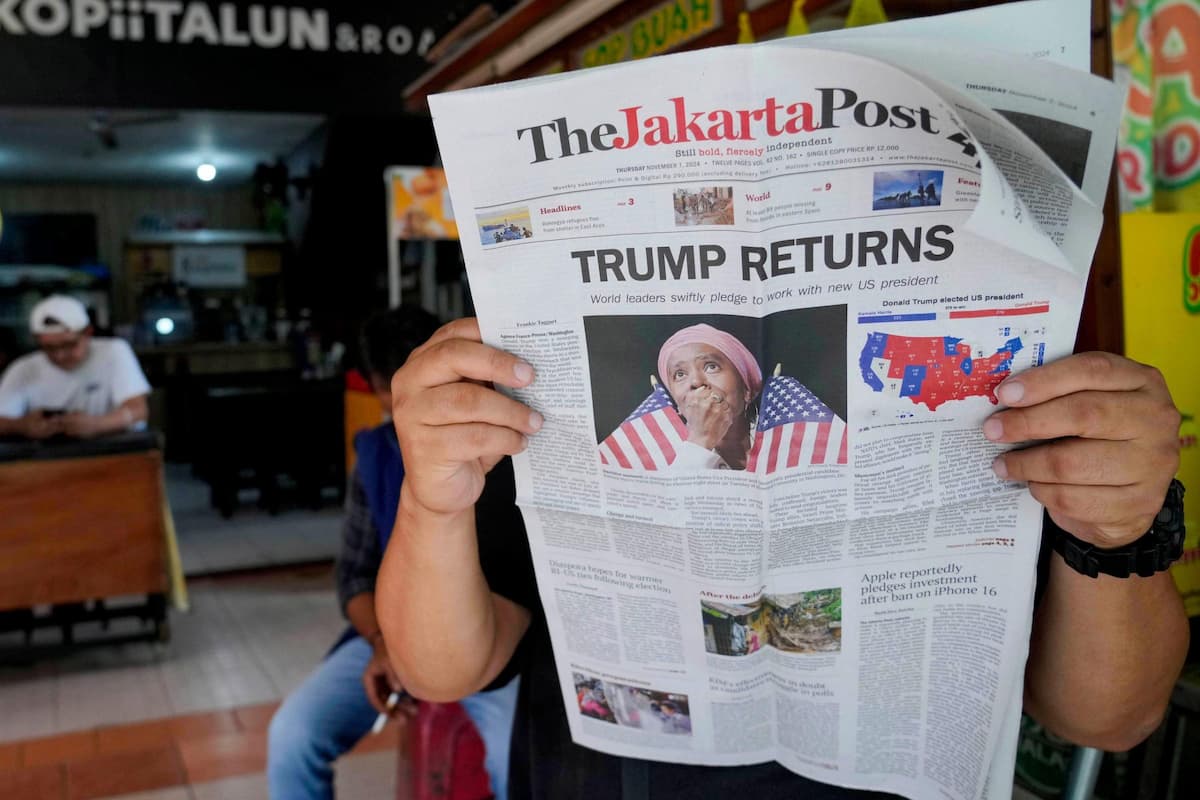 7 November, 2024, Jakarta, Indonesia; a newspaper’s front-page reports on US election results (Image: Tatan Syuflana / Associated Press / Alamy)