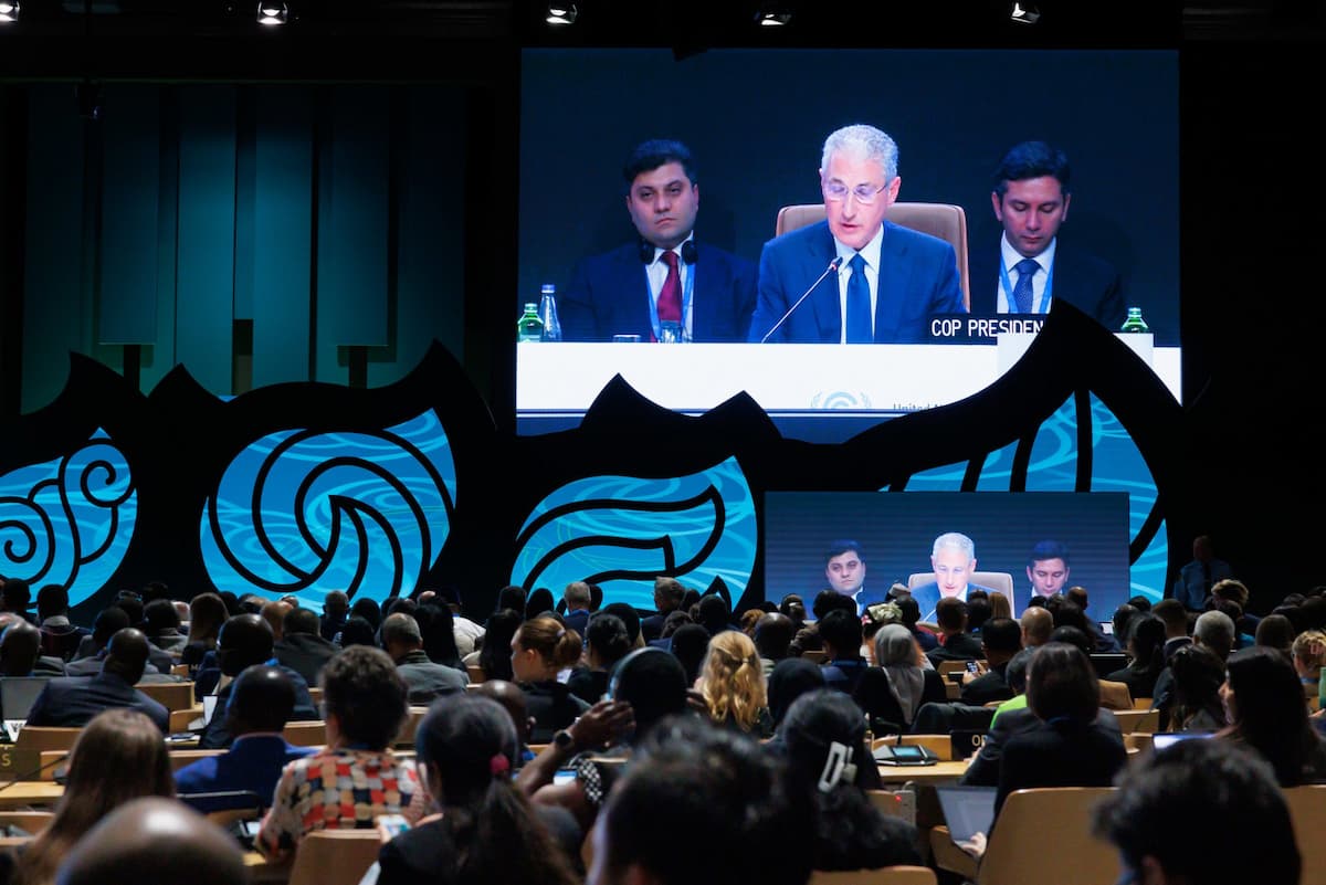 COP29 president and Azerbaijan’s Minister of Ecology and Natural Resources, Mukhtar Babayev, speaks at the opening plenary in Baku. Earlier, Azerbaijan president Ilham Aliyev said that oil and gas are “a gift from God” and questioned criticism of his country’s dependence on fossil fuel production and exports (Image: Kamran Guliyev / UN Climate Change, CC BY-NC-SA)