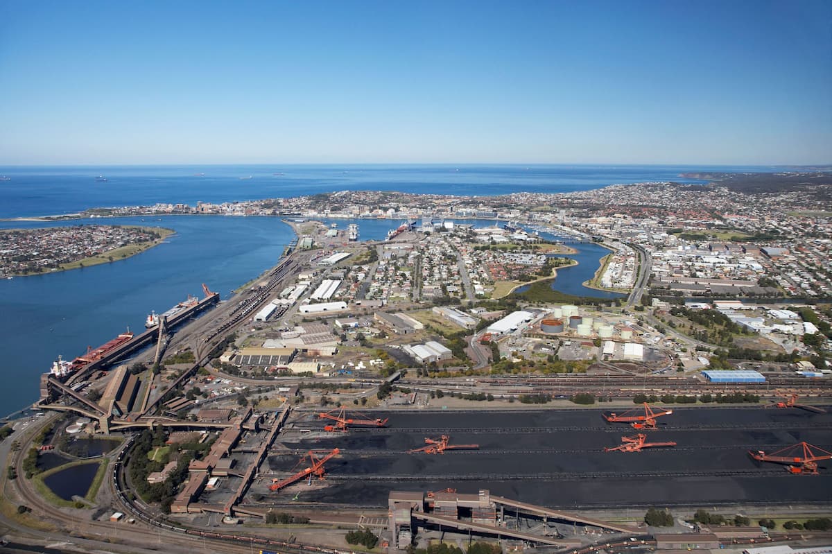 Newcastle is one of the largest coal export ports in Australia, where coal to be received by train and loaded onto massive ships to export (Image: David Wall / Alamy )