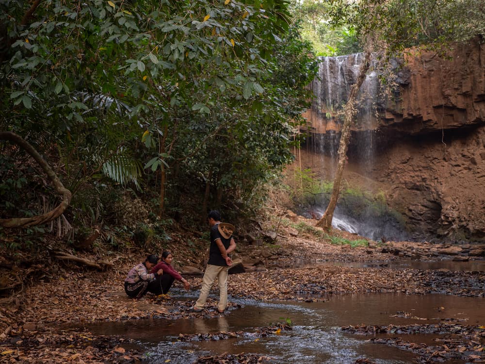 The Laeng Kao waterfall in Cambodia where the Bunong village of Andoung Kraloeng has been developing an eco-tourism site with support from the Keo Seima REDD+ project, even as the Ministry of Environment – the project proponent – has granted land overlapping with the site to private developers. WCS says the Ministry verbally committed to canceling private development but Minister of Environment Eang Sophalleth declined to confirm this. Image by Jack Brook.