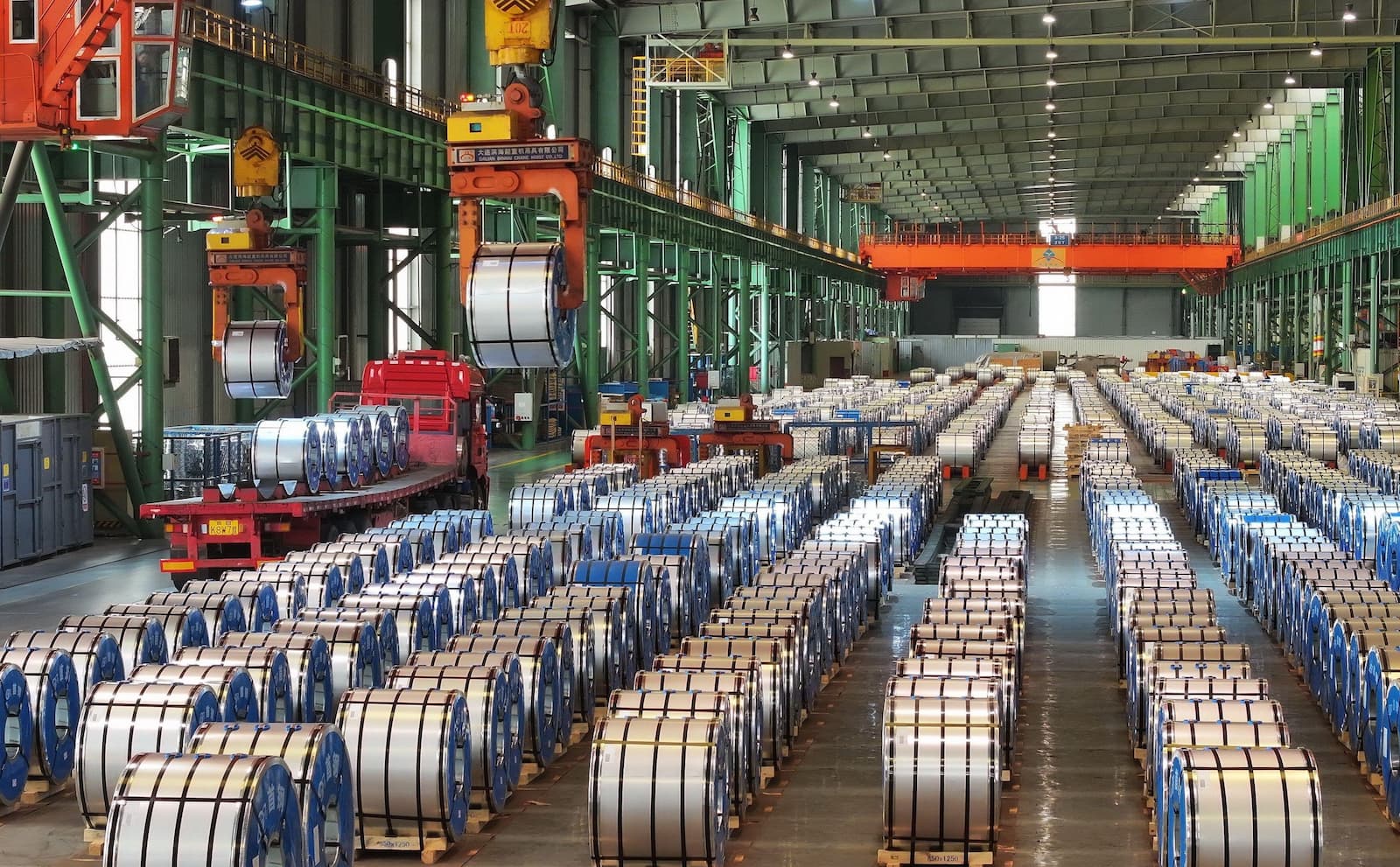 Rolled steel in a warehouse run by steelmaker Shougang in Tangshan, Hebei province (Image: Zhu Xudong / Xinhua / Alamy)
