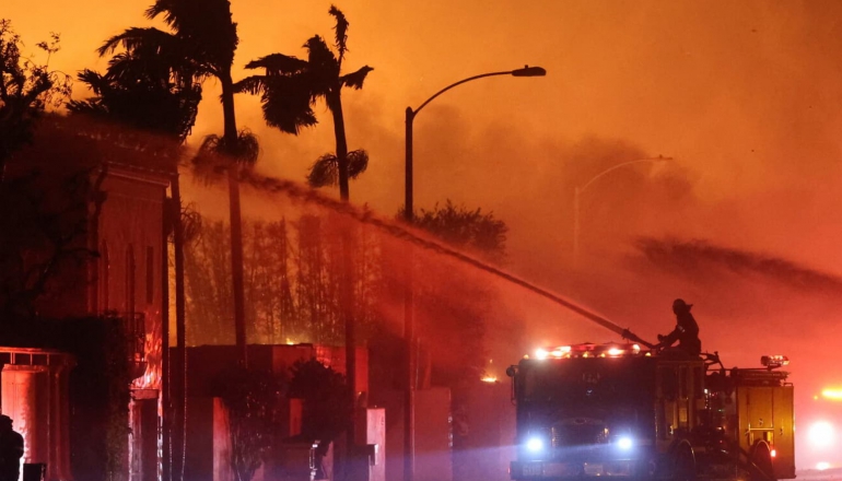 Thousands evacuate as deadly wildfires devastate Los Angeles