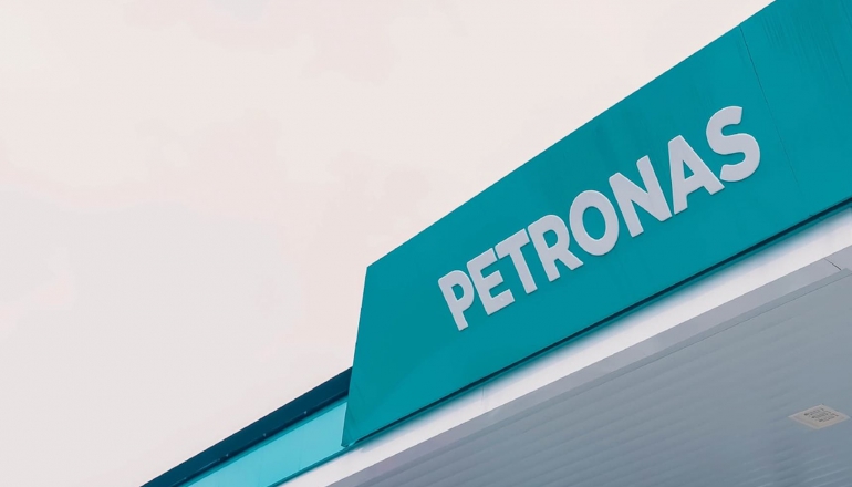 Petronas cuts jobs, bets on low-carbon transition as profits decline